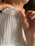 Camicia bianca con colletto arricciato