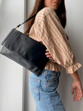 Maxi pochette nera con tracolla