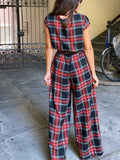 PRE ORDINE • Pantalone a palazzo tartan nero e rosso