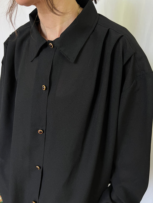 Camicia nera semitrasparente