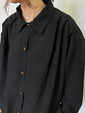 Camicia nera semitrasparente