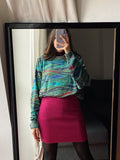 Maglione colorato base verde