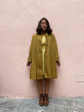 Trench senape con colletto