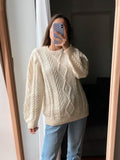Maglione di lanona panna intrecciato fatto a mano