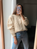 Maglione di lanona panna intrecciato lavorazione noccioline