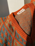 Maglione ruggine a rombi
