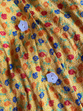 Abito giallo con schiena nuda