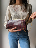 Borsetta bordeaux con catenina