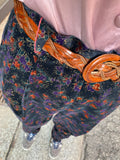 Pantaloni velluto a fiorellini viola