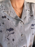 Camicia grigia ricamata