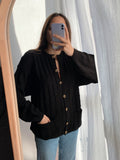 Cardigan nero intrecciato