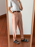 Pantaloni stock Benetton • pesca