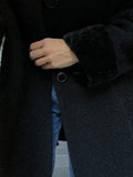 Cappotto nero con profili in velluto