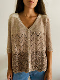 Cardigan traforato beige luccicante