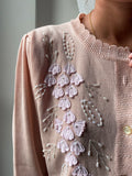 Cardigan rosa tutto decorato