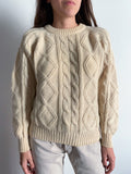 Maglione in lanona panna intrecciato
