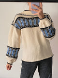 Maglione panna con maniche a sbuffo