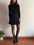 Gonna mini nera a pieghe