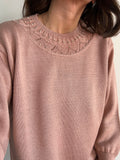 Maglione rosa con perline