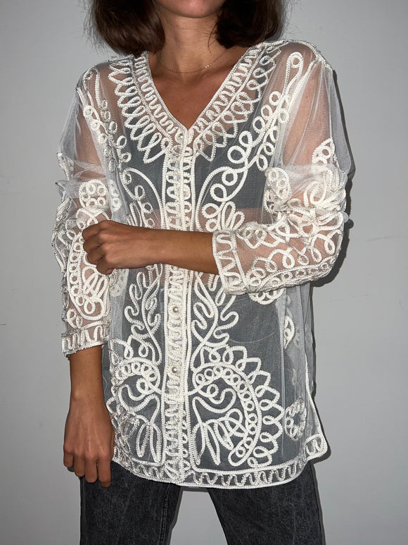 Camicia bianca trasparente con ricami