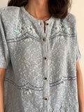 Cardigan mezza manica azzurro con ricami