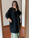 PRE ORDINE • Maxi cardigan intrecciato con cintura nero