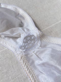 Reggiseno bianco con decorazione