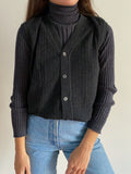 Gilet grigio scuro con bottoni