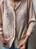 Cardigan rosa tutto decorato
