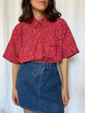 Camicia rossa a fiorellini