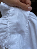 Camicia bianca crop con maniche a sbuffo