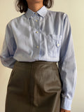 Camicia azzurra con tasca
