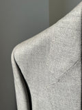 Completo di lana grigio chiaro