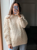 Maglione di lanona panna intrecciato fatto a mano lavorazione noccioline