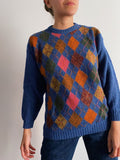 Maglione azzurro con rombi colorati