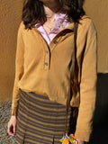 Maglione senape collo a polo