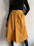 Gonna pantalone gialla di lana