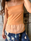 Top di seta color pesca