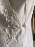 Camicia bianca incrociata