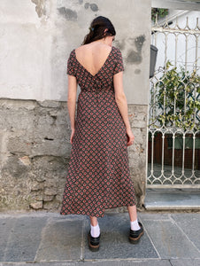 Abito roselline con scollo dietro