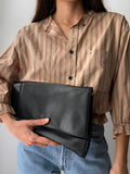 Maxi pochette nera con tracolla