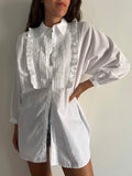 Camicia bianca con rouche