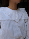 Camicia bianca con maxi collo ricamato