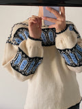 Maglione panna con maniche a sbuffo