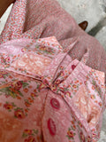 Abito rosa con gilet