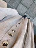 Gonna beige con bottoni