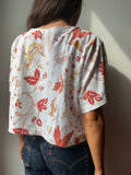 T-shirt Leggerissima con tasche • fiorata senape e bordeaux