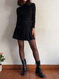 Gonna mini nera a pieghe