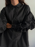 PRE ORDINE • Camicia oversize con manica arricciata nera