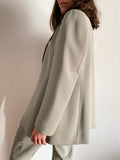 Completo grigio perla